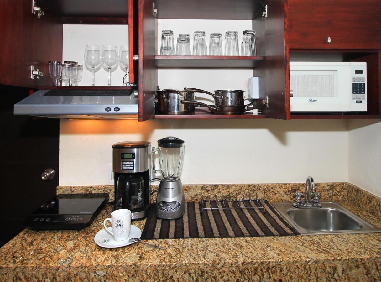 Papagayo Hotel Boutique Playa del Carmen Exterior foto A kitchen with granite countertops