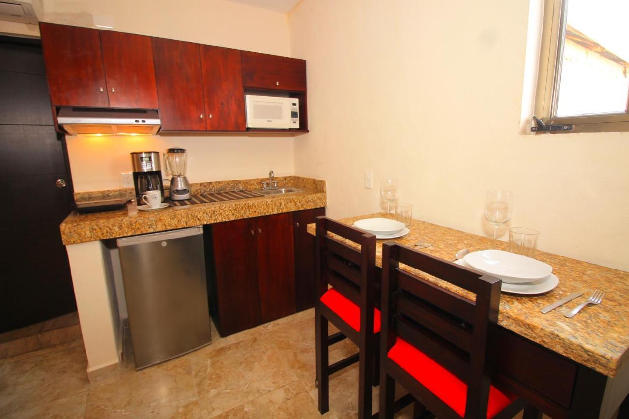 Papagayo Hotel Boutique Playa del Carmen Exterior foto A small kitchen