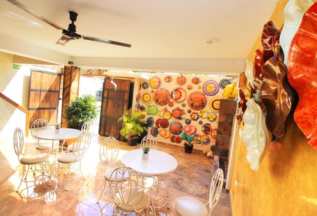 Papagayo Hotel Boutique Playa del Carmen Exterior foto The interior of the gallery