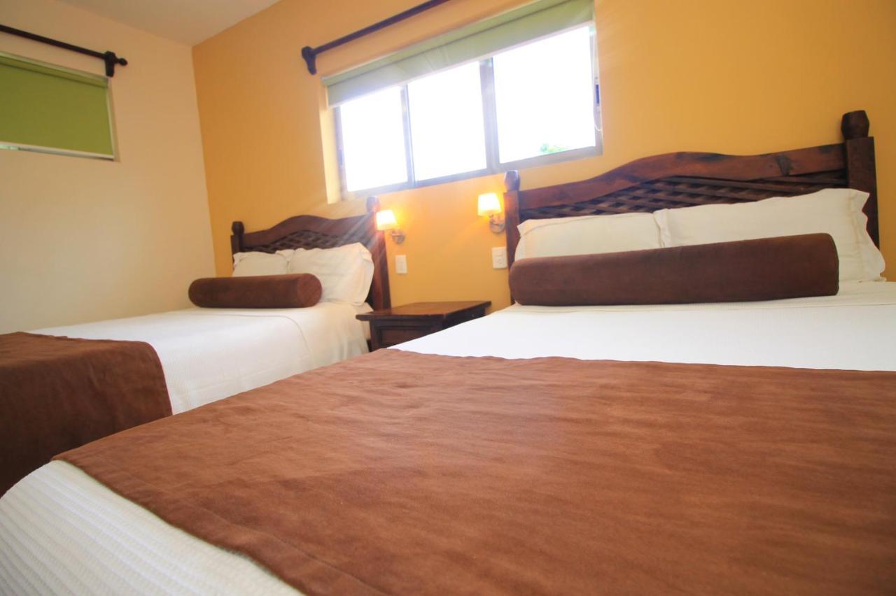 Papagayo Hotel Boutique Playa del Carmen Exterior foto A room at the hotel